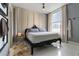 Bright bedroom featuring a comfortable bed, large window, and sophisticated decor at 57 Forsyth Nw St # 5F, Atlanta, GA 30303