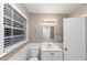 Bathroom with a large mirror and window that provides natural light at 1834 Hillsdale Dr, Decatur, GA 30032