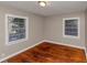Bedroom with hardwood floors and natural light from windows at 1834 Hillsdale Dr, Decatur, GA 30032