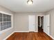 Bedroom with hardwood floors and neutral walls at 1834 Hillsdale Dr, Decatur, GA 30032
