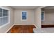 Bright dining area featuring hardwood floors and large windows at 1834 Hillsdale Dr, Decatur, GA 30032
