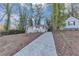 Well maintained single Gathering home with a long concrete driveway at 1834 Hillsdale Dr, Decatur, GA 30032