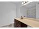 Clean bathroom with a large mirror, vanity with storage, and a well-maintained space at 305 Mill Pond Se Ct, Smyrna, GA 30082