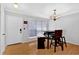 Dining room with a table, chairs, bench, and a chandelier at 305 Mill Pond Se Ct, Smyrna, GA 30082