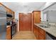 A kitchen featuring stainless steel appliances and granite countertops at 305 Mill Pond Se Ct, Smyrna, GA 30082