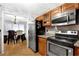 Kitchen featuring stainless steel appliances and a view into dining area at 305 Mill Pond Se Ct, Smyrna, GA 30082