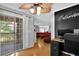 Office space featuring natural light, fan and view into living room at 305 Mill Pond Se Ct, Smyrna, GA 30082