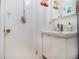 Modest bathroom featuring a white vanity with ample storage and an updated faucet at 850 Third St, Stone Mountain, GA 30083