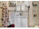 Small bathroom features white sink and cabinet and a shower with curtain at 850 Third St, Stone Mountain, GA 30083