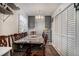 The dining area includes a large table and many matching chairs at 850 Third St, Stone Mountain, GA 30083