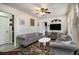 Cozy living room featuring modern decor, comfortable seating, and a ceiling fan at 850 Third St, Stone Mountain, GA 30083