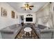 Inviting living room featuring three sofas, stylish decor, and a large window at 850 Third St, Stone Mountain, GA 30083