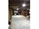 Unfinished basement has exposed ceiling and wood studs and a concrete floor at 3320 Donegal Way, Snellville, GA 30039