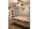 Inviting bedroom with built-in shelving, a desk, and a comfortable bed at 3320 Donegal Way, Snellville, GA 30039