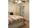 Comfortable bedroom with a ceiling fan, closet, and views of the upstairs landing at 3320 Donegal Way, Snellville, GA 30039