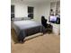 Spacious bedroom with a built-in desk, perfect for studying or gaming, and modern decor at 3320 Donegal Way, Snellville, GA 30039
