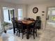 Bright breakfast nook with large windows and a stylish dining set for everyday meals at 3320 Donegal Way, Snellville, GA 30039