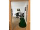 Office space features a putting green and a desk in a room with several windows at 3320 Donegal Way, Snellville, GA 30039