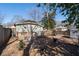 The backyard features a wooden deck, outdoor seating, and a grill at 1816 Williams Ave, East Point, GA 30344