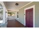 Inviting front porch featuring a craftsman-style door and a comfortable outdoor space at 1816 Williams Ave, East Point, GA 30344