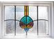 Close up of stained glass window design with blue, purple, and yellow glass at 1816 Williams Ave, East Point, GA 30344