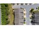 Aerial view of townhomes showcasing the roof lines, community layout, and surrounding streets at 2289 Emerald Sky Dr, Smyrna, GA 30080