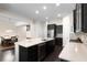Spacious kitchen with a large center island, stainless steel appliances, and modern finishes at 2289 Emerald Sky Dr, Smyrna, GA 30080