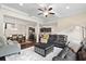 Open floor plan with a seamless transition between the living room, dining room, and kitchen area at 2289 Emerald Sky Dr, Smyrna, GA 30080
