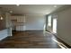 Bright living room with hardwood floors and lots of natural light at 258 Depot Landing Rd # 53, Auburn, GA 30011