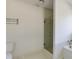 Bathroom featuring a glass-door shower and neutral color palette at 270 Grapevine Run, Sandy Springs, GA 30350