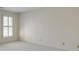 Bedroom featuring a neutral color palette and a window with shutter style blinds at 270 Grapevine Run, Sandy Springs, GA 30350