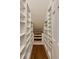 Walk-in closet with built-in shelving and drawers offering plenty of storage at 270 Grapevine Run, Sandy Springs, GA 30350