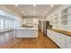 Spacious kitchen with hardwood floors, island with sink, and stainless steel appliances at 270 Grapevine Run, Sandy Springs, GA 30350