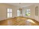 Bright, airy room with hardwood floors, built-in shelving, and ample natural light at 270 Grapevine Run, Sandy Springs, GA 30350