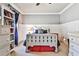 Bedroom with carpet flooring, baseboard trim, decorative furniture and light gray walls at 705 Chanson Sw Dr, Marietta, GA 30064