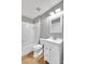 Bathroom with white tub, vanity and floors at 1575 Ridenour Nw Pkwy # 1119, Kennesaw, GA 30152