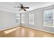 Sun-filled bedroom with multiple windows for natural light and wood-look floors at 1575 Ridenour Nw Pkwy # 1119, Kennesaw, GA 30152