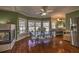 Cozy dining area featuring a unique fireplace and lots of natural light at 520 Camp Perrin Rd, Lawrenceville, GA 30043