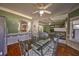 Open concept dining area with view of the living room and fireplace at 520 Camp Perrin Rd, Lawrenceville, GA 30043