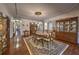 Classic dining room with hardwood floors, seating for six, and china cabinet at 520 Camp Perrin Rd, Lawrenceville, GA 30043