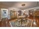 Open dining area featuring hardwood floors and natural light at 520 Camp Perrin Rd, Lawrenceville, GA 30043