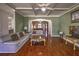 Bright living room with hardwood floors and view of the kitchen at 520 Camp Perrin Rd, Lawrenceville, GA 30043