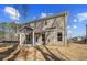 View of backyard featuring a covered patio with white columns at 249 Chiswick Loop, Stockbridge, GA 30281