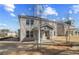 Brick house showing the backyard featuring a covered patio and green space at 249 Chiswick Loop, Stockbridge, GA 30281