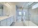 Spacious bathroom featuring a double vanity, tile flooring, and glass shower at 249 Chiswick Loop, Stockbridge, GA 30281