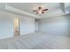 Spacious bedroom with trey ceilings and ensuite bathroom at 249 Chiswick Loop, Stockbridge, GA 30281