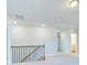 Upstairs hallway with views of the stairwell at 249 Chiswick Loop, Stockbridge, GA 30281