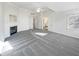 Large main bedroom featuring a fireplace, ceiling fan, and an ensuite bathroom at 3348 Terrace Hedge Pl, Dacula, GA 30019