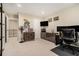 Open and bright bedroom area features a computer desk and modern shelving at 5751 Evadale Trace, Mableton, GA 30126