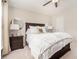 Bedroom featuring ceiling fan, a comfy queen size bed, and neutral decor at 5751 Evadale Trace, Mableton, GA 30126